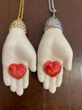 Carica l'immagine nel visualizzatore di Gallery, Santa Pupa bianca/cuore rosso